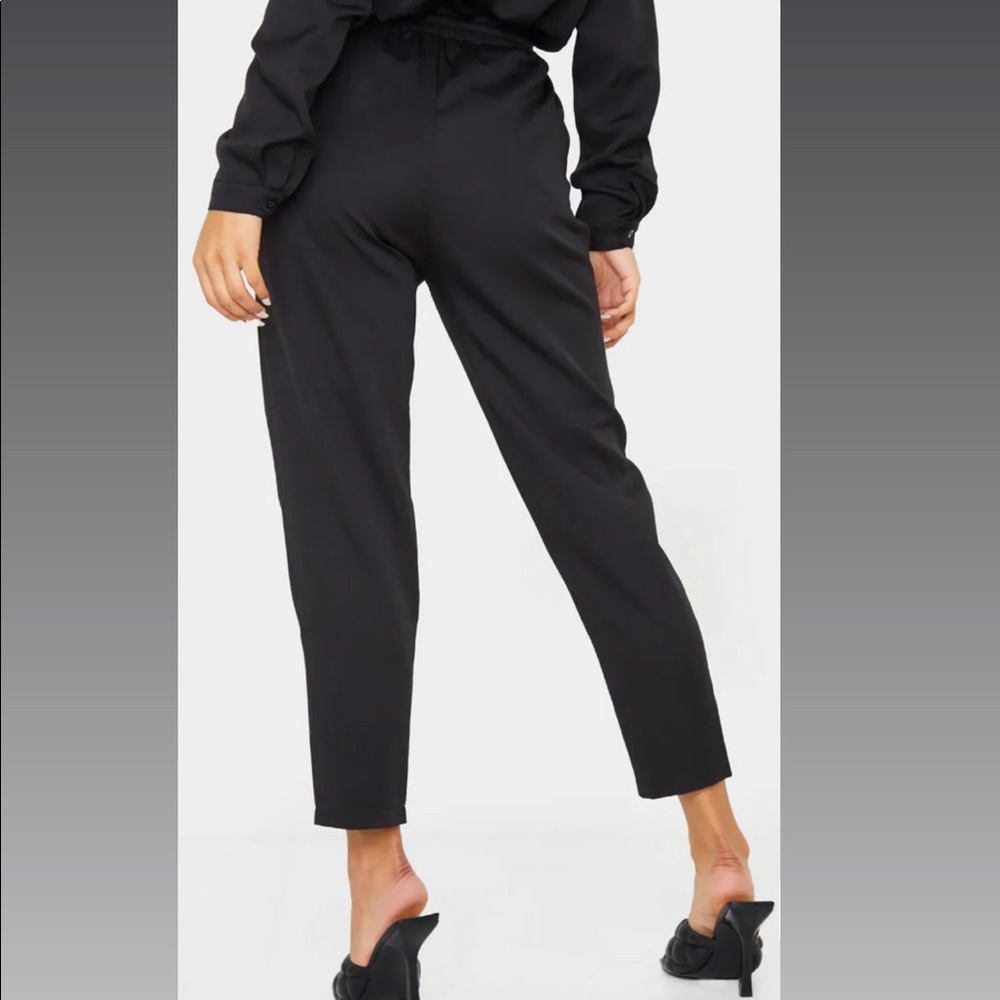 Never worn brand new with Tag. Cigarette Pant.